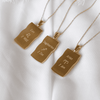 Image showing the back of the Gold Zodiac Necklace in Aries, Sagittarius and Leo