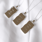 Image shows the back of zodiac necklaces in silver in Aries, Sagittarius and Leo