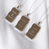 Image shows the back of zodiac necklaces in silver in Gemini, Libra and Aquarius