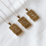 Image shows the back of zodiac necklaces in gold in Taurus, Capricorn and Virgo variants